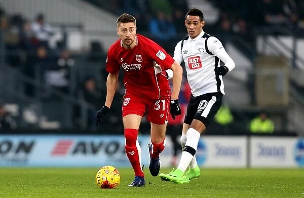 Bristol City's Jens Hegeler Outruns Derby County's Thomas Ince in Championship Clash