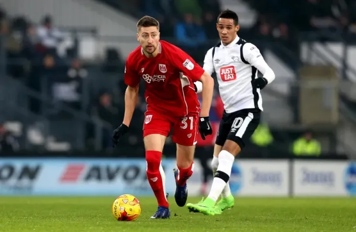 Framed Print : Bristol City's Jens Hegeler Outruns Derby County's Thomas Ince in Championship Clash