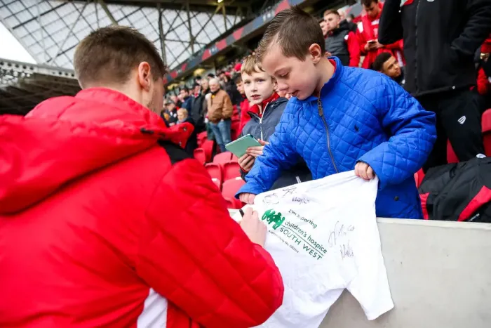 Framed Print : Bristol City's Jens Hegeler Signs Shirt for CHSW at Ashton Gate Framed Print : Bristol City's Jens Hegeler Signs Shirt for CHSW at Ashton Gate
