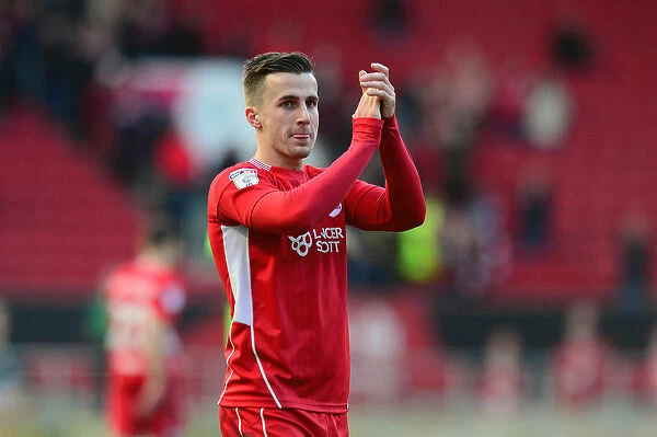 Bristol City's Joe Bryan Applauding Fans After Securing Championship Victory Over Burton Albion