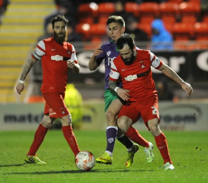 Framed Print : Bristol City's Joe Bryan Chases Down Chris Dagnall of Leyton Orient in Sky Bet League One Clash Framed Print : Bristol City's Joe Bryan Chases Down Chris Dagnall of Leyton Orient in Sky Bet League One Clash