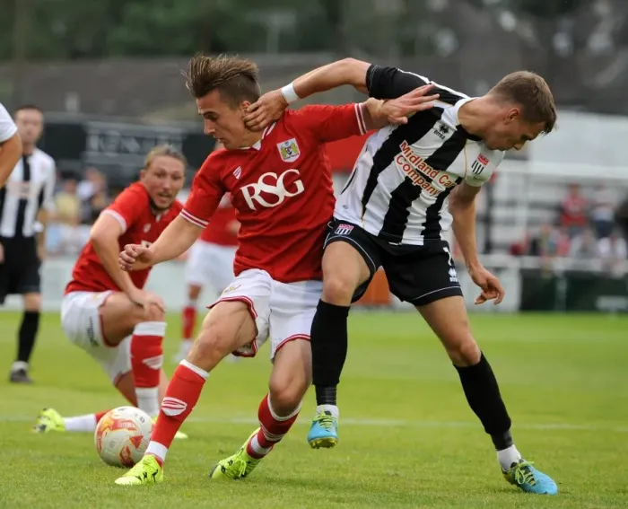 Framed Print : Bristol City's Joe Bryan Clashes with Bath City's Joe McClennan during Pre-Season Friendly at Twerton Park (2015) Framed Print : Bristol City's Joe Bryan Clashes with Bath City's Joe McClennan during Pre-Season Friendly at Twerton Park (2015)