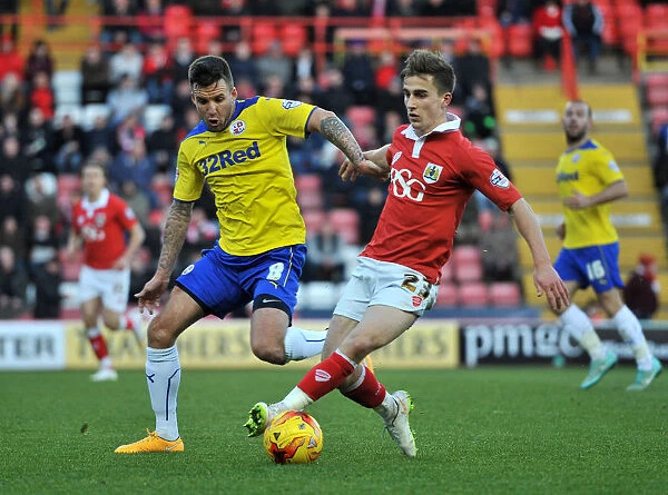 Bristol City's Joe Bryan Fends Off Jimmy Smith's Pressure During Sky Bet League One Clash