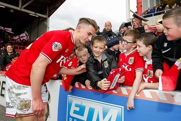 Bristol City's Joe Bryan Greets Young Fans After Bristol City vs. Cardiff City Match