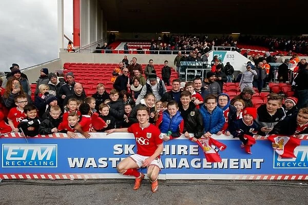 Bristol City's Joe Bryan Greets Young Fans After Championship Match