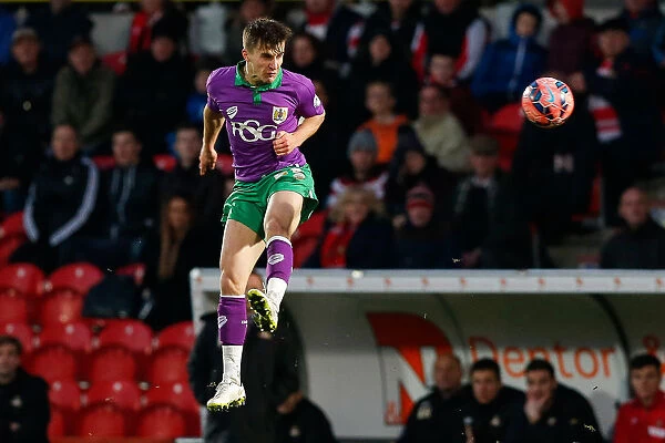 Bristol City's Joe Bryan Heads the Ball in FA Cup Clash vs Doncaster Rovers