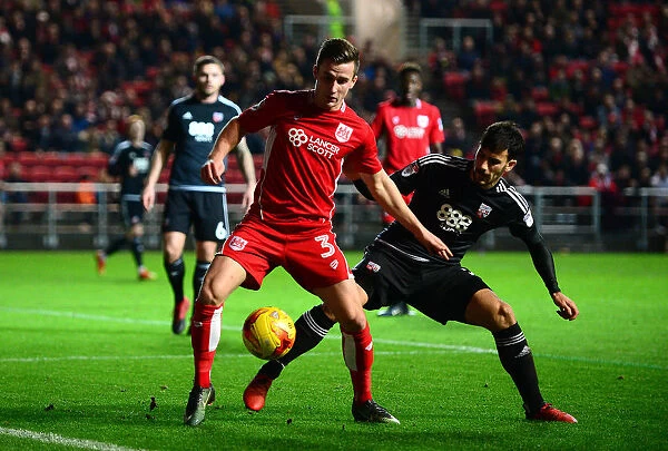 Bristol City's Joe Bryan Holds Off Brentford's Maxime Colin during Sky Bet Championship Match