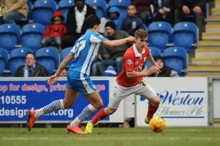 Framed Print : Bristol City's Joe Bryan Outmaneuvers Colchester United's Macauley Bonne During Sky Bet League One Clash Framed Print : Bristol City's Joe Bryan Outmaneuvers Colchester United's Macauley Bonne During Sky Bet League One Clash