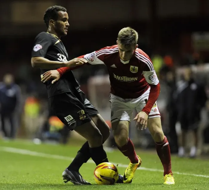 Framed Print : Bristol City's Joe Bryan Outmaneuvers Crawley Town's James Hurst During Sky Bet League One Clash at Ashton Gate Framed Print : Bristol City's Joe Bryan Outmaneuvers Crawley Town's James Hurst During Sky Bet League One Clash at Ashton Gate