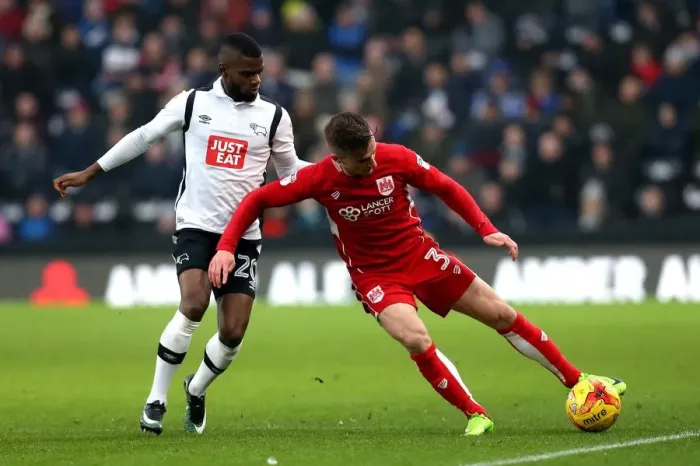 Framed Print : Bristol City's Joe Bryan Outmaneuvers Derby County's Abdoul Camara Framed Print : Bristol City's Joe Bryan Outmaneuvers Derby County's Abdoul Camara