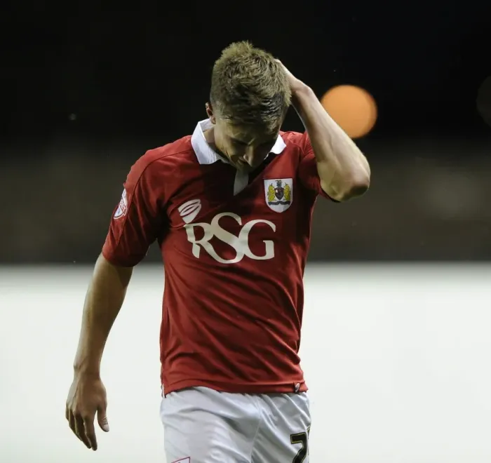 Framed Print : Bristol City's Joe Bryan in Pain: Injury Sidelines Star Player Against Oxford United Framed Print : Bristol City's Joe Bryan in Pain: Injury Sidelines Star Player Against Oxford United