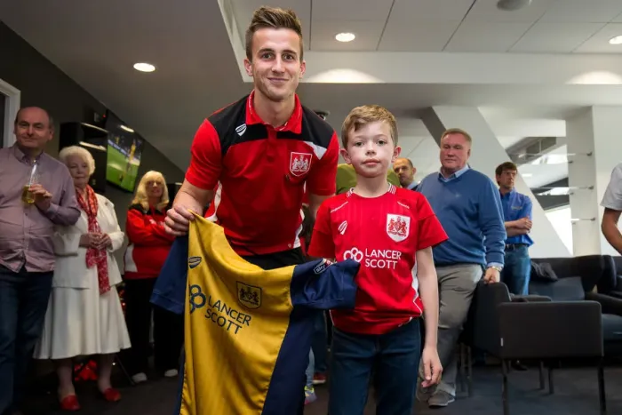 Framed Print : Bristol City's Joe Bryan Presents Sponsors with Signed Shirt after Championship Match against Birmingham City Framed Print : Bristol City's Joe Bryan Presents Sponsors with Signed Shirt after Championship Match against Birmingham City