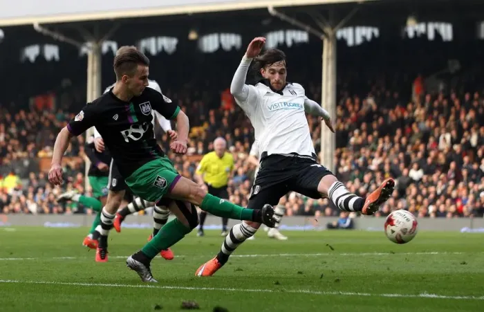 Framed Print : Bristol City's Joe Bryan Sends a Cross Past Fulham's Fernando Amorebieta in Championship Clash Framed Print : Bristol City's Joe Bryan Sends a Cross Past Fulham's Fernando Amorebieta in Championship Clash