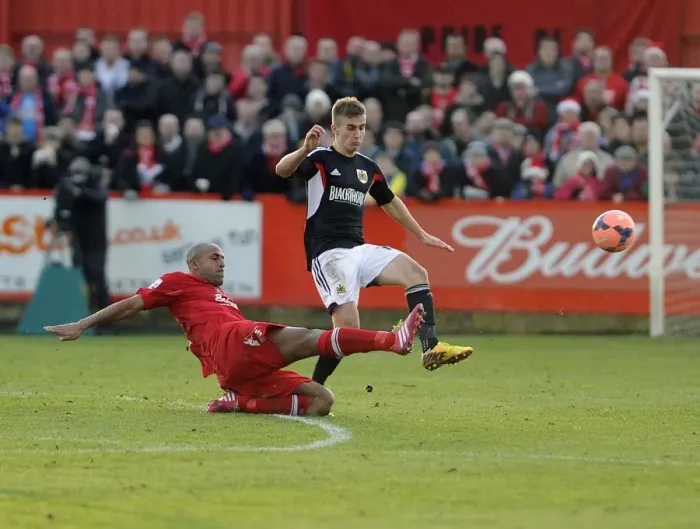 Framed Print : Bristol City's Joe Bryan Tackled During FA Cup Match against Tamworth Framed Print : Bristol City's Joe Bryan Tackled During FA Cup Match against Tamworth