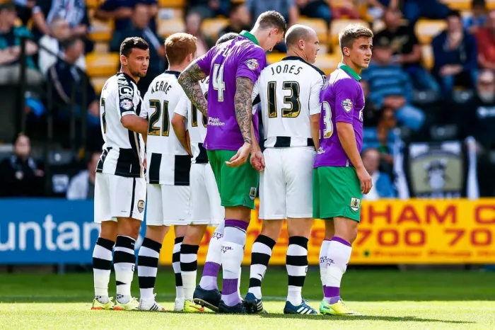 Framed Print : Bristol City's Joe Bryan Watches Notts County Attack from the Wall Framed Print : Bristol City's Joe Bryan Watches Notts County Attack from the Wall