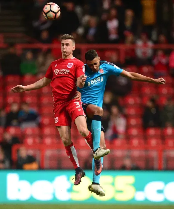 Framed Print : Bristol City's Joe Bryan Wins Aerial Battle Against Fleetwood Town in FA Cup Third Round Framed Print : Bristol City's Joe Bryan Wins Aerial Battle Against Fleetwood Town in FA Cup Third Round