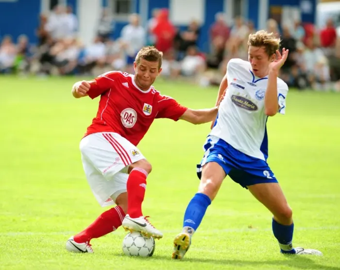 Framed Print : Bristol Citys John O Flynn turns the Vallens defence