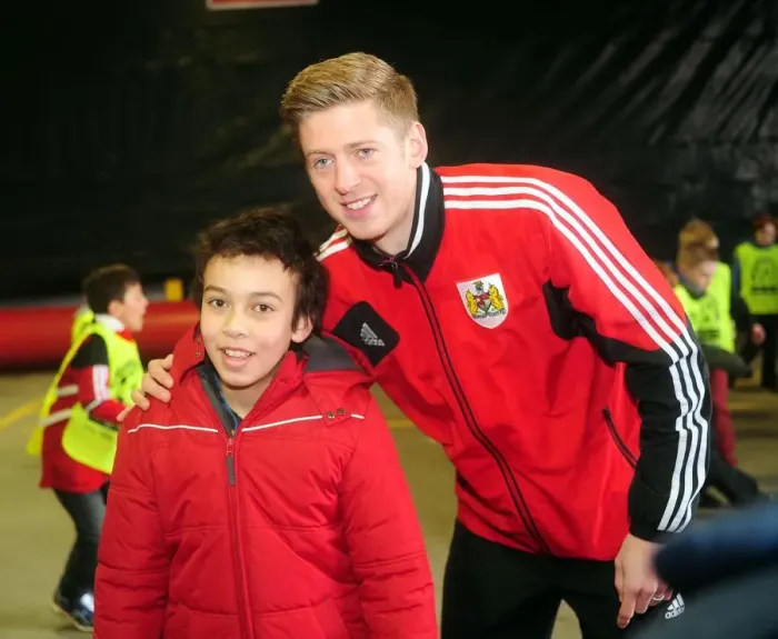 Framed Print : Bristol City's Jon Stead Engages with a Fan in the Community: Bristol City vs. Sheffield Wednesday, April 1, 2013