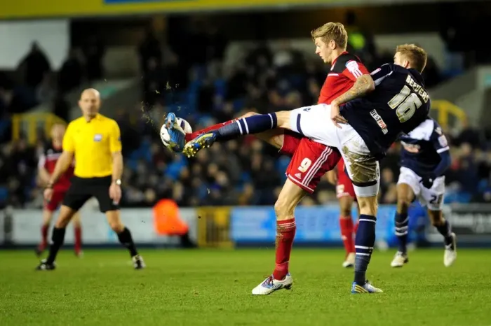 Framed Print : Bristol City's Jon Stead Fights Off Mark Beevers Pressure in Championship Clash at The Den Framed Print : Bristol City's Jon Stead Fights Off Mark Beevers Pressure in Championship Clash at The Den