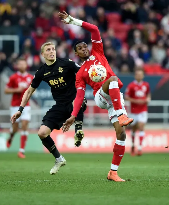 Framed Print : Bristol City's Jonathan Kodjia Fights for Supremacy in the Sky Bet Championship Clash Against Bolton Wanderers Framed Print : Bristol City's Jonathan Kodjia Fights for Supremacy in the Sky Bet Championship Clash Against Bolton Wanderers