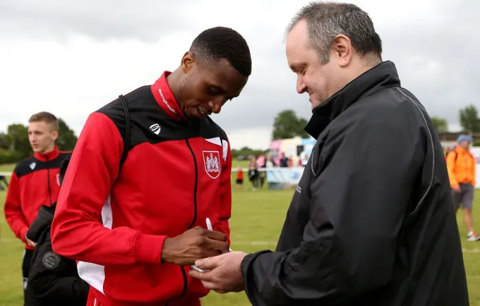 Framed Print : Bristol City's Jonathan Kodjia Greets Fans with Autographs at Hengrove Athletic Pre-Season Friendly