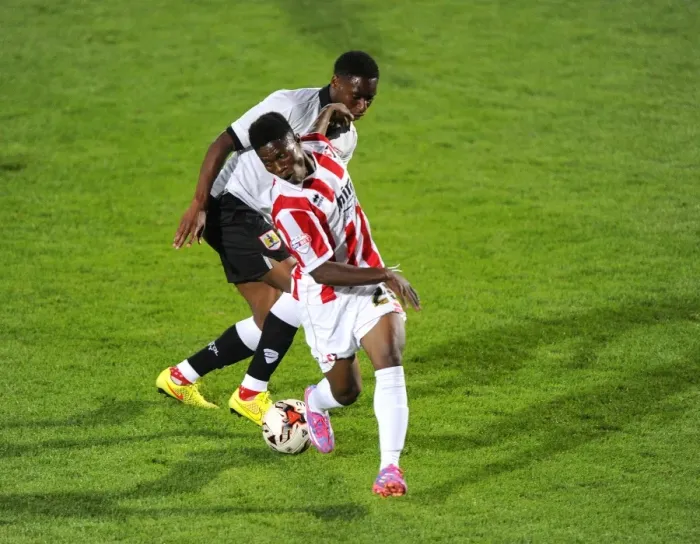Framed Print : Bristol City's Jordan Wynter vs. Koby Arthur in Intense Battle during Cheltenham Town vs. Bristol City Pre-Season Friendly Framed Print : Bristol City's Jordan Wynter vs. Koby Arthur in Intense Battle during Cheltenham Town vs. Bristol City Pre-Season Friendly
