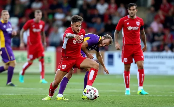 Framed Print : Bristol City's Josh Brownhill Outmaneuvers Cheltenham Town's James Dayton in Preseason Friendly Framed Print : Bristol City's Josh Brownhill Outmaneuvers Cheltenham Town's James Dayton in Preseason Friendly