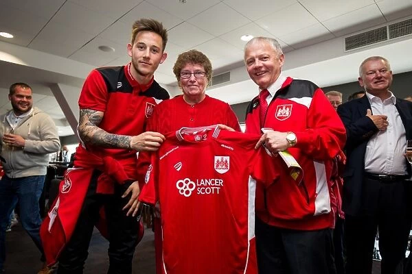 Bristol City's Josh Brownhill Presents Sponsors with Signed Shirt after Championship Match against Birmingham City