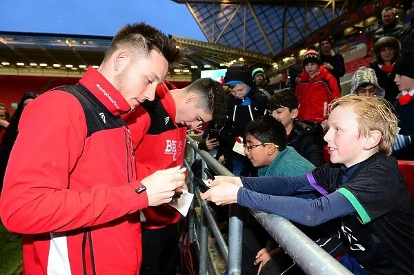 Bristol City's Josh Brownhill Signs Autographs for Adoring Fans during Bristol City v Huddersfield Town Match