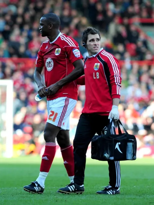 Framed Print : Bristol City's Kalifa Cisse Suffers Injury Exit vs Burnley, Championship 2011