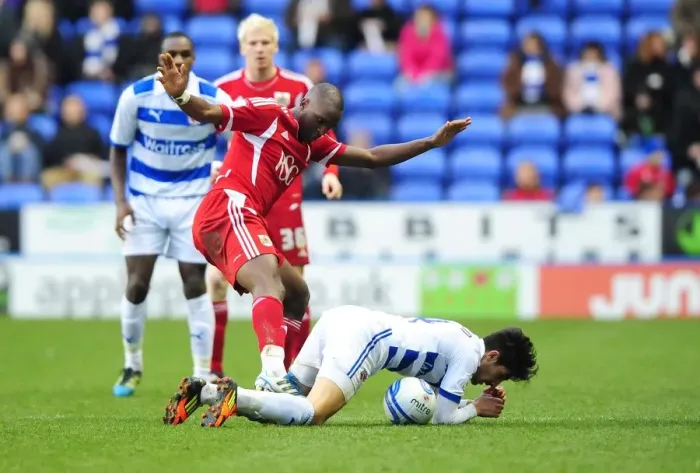 Framed Print : Bristol City's Kalifa Cisse vs. Jem Karacan in Championship Clash at Reading, January 2012