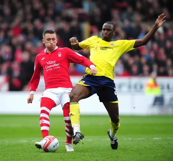 Framed Print : Bristol City's Kalifa Cisse vs. Nottingham Forest's Radoslaw Majewski: Battle for the Ball at The City Ground (Nottingham Forest v Bristol City, Football)