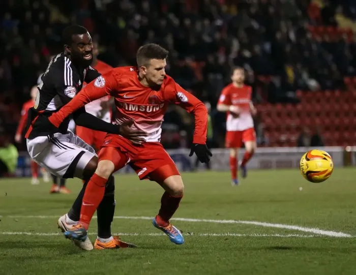 Framed Print : Bristol City's Karleigh Osborne Blocks Leyton Orient's Dean Cox from Goal in Sky Bet League One Clash