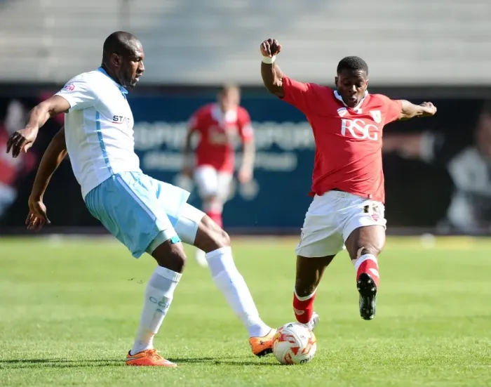 Framed Print : Bristol City's Kieran Agard Closes In on Coventry City's Reda Johnson - Intense Moment from the Pitch (Sky Bet League One, Ashton Gate) Framed Print : Bristol City's Kieran Agard Closes In on Coventry City's Reda Johnson - Intense Moment from the Pitch (Sky Bet League One, Ashton Gate)