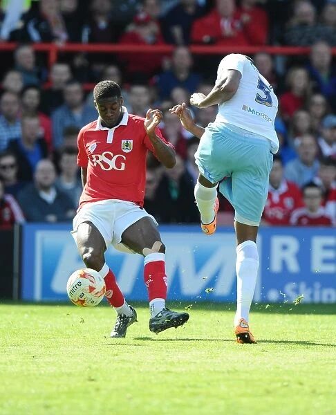 Bristol City's Kieran Agard Denies Coventry City's Reda Johnson, Narrowly Misses Goal