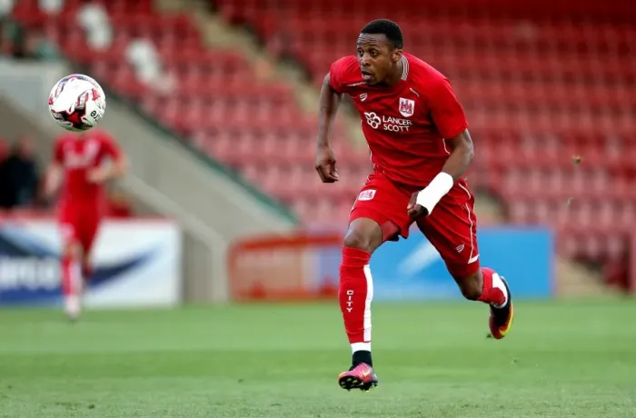 Framed Print : Bristol City's Kodjia Chases Down the Ball in Preseason Clash against Cheltenham Town Framed Print : Bristol City's Kodjia Chases Down the Ball in Preseason Clash against Cheltenham Town