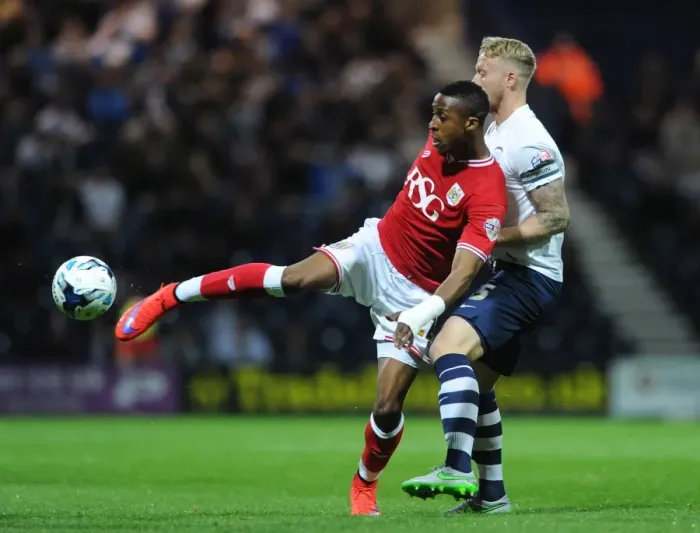 Framed Print : Bristol City's Kodjia Fends Off Preston's Clarke in Championship Clash Framed Print : Bristol City's Kodjia Fends Off Preston's Clarke in Championship Clash