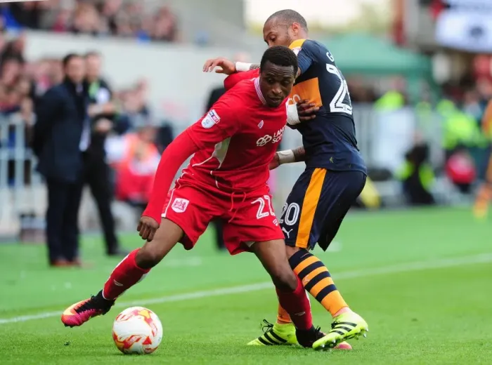 Framed Print : Bristol City's Kodjia Slips Past Newcastle's Gouffran in 2016 Championship Clash
