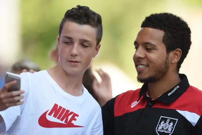 Framed Print : Bristol City's Korey Smith Celebrates with Fan after Victory over Wigan Athletic