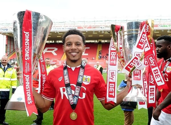 Bristol City's Korey Smith Lifts Sky Bet League One and JPT Trophies after Winning Double