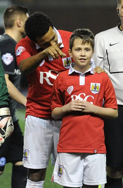 Bristol City's Korey Smith and Mascot Celebrate Win Against Peterborough United, February 17, 2015