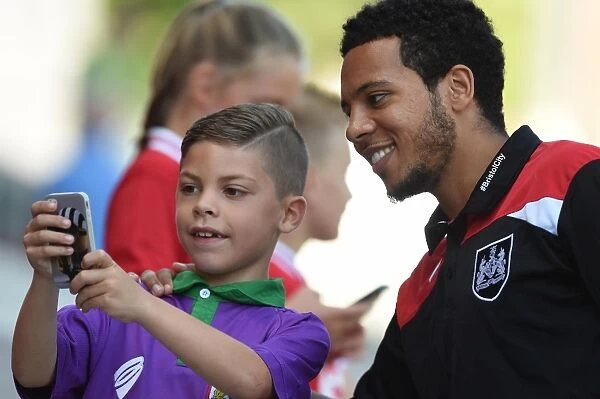 Bristol City's Korey Smith and Young Fan Share a Moment at Ashton Gate