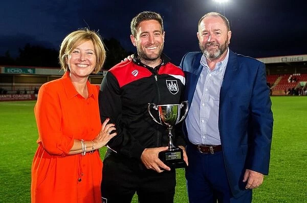 Bristol City's Lee Johnson and Cheltenham Town Manager Share a Moment with the Johnson Cup