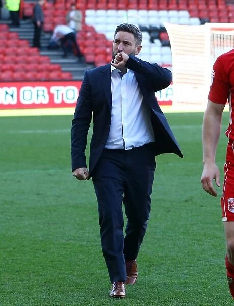 Bristol City's Lee Johnson Embraces Ecstatic Fans in Promotion Celebration at Ashton Gate