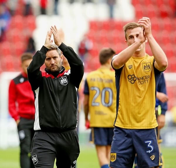Bristol City's Lee Johnson and Joe Bryan Celebrate Full-Time Victory Over Rotherham United