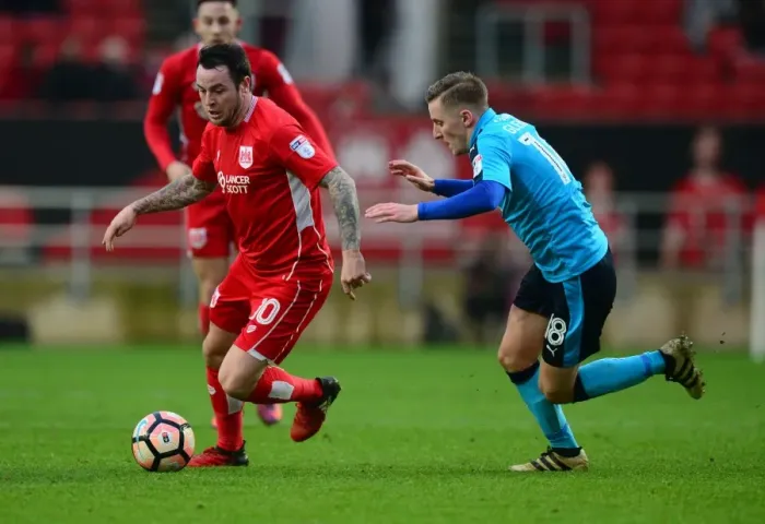 Framed Print : Bristol City's Lee Tomlin in Action Against Fleetwood Town in FA Cup Third Round at Ashton Gate Framed Print : Bristol City's Lee Tomlin in Action Against Fleetwood Town in FA Cup Third Round at Ashton Gate