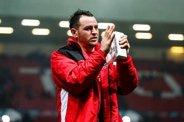 Bristol City's Lee Tomlin Celebrates 4-0 Victory Over Huddersfield Town, Saving Them from Relegation