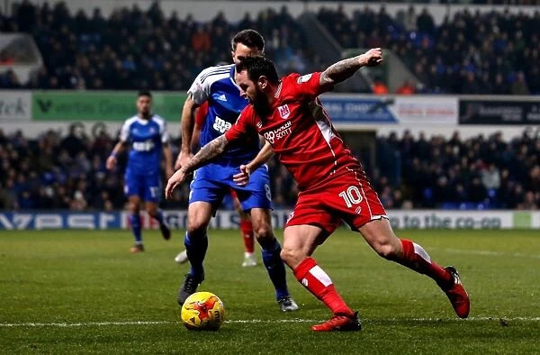 Bristol City's Lee Tomlin Faces Off Against Ipswich Town's Cole Skuse in Championship Clash