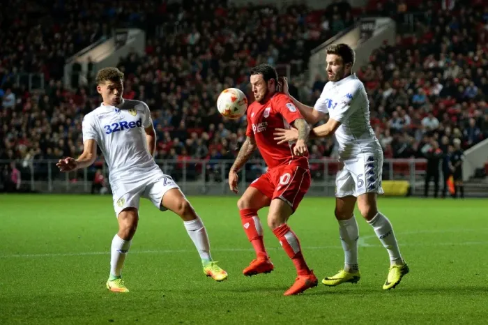 Framed Print : Bristol City's Lee Tomlin Holds Off Leeds United Defenders During Sky Bet Championship Match Framed Print : Bristol City's Lee Tomlin Holds Off Leeds United Defenders During Sky Bet Championship Match