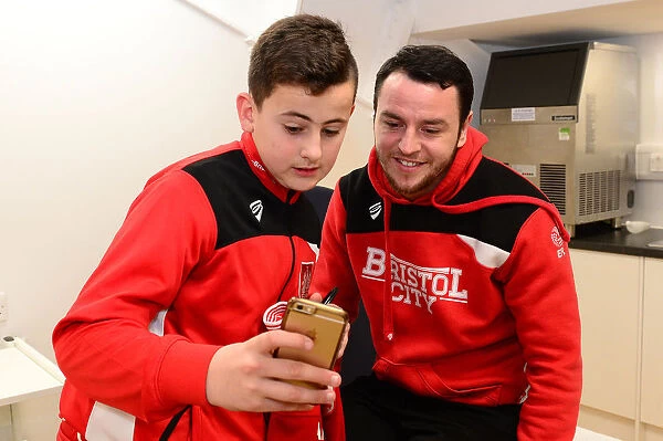 Bristol City's Lee Tomlin with Mascot Before Fulham Clash, 2017